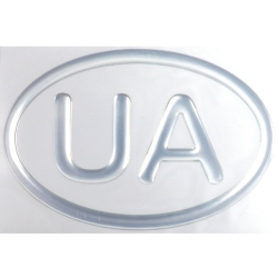 Наліпка силіконова "UA" контур в овалі хром (12x8)